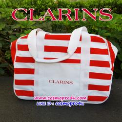 กระเป๋า CLARINS คลาแรงส์ ผ้าหนาลายขาวแดง มีซิบ มีช่องใส่ของตรงโลโก้ด้านหน้ากระเป๋า ขนาด 16x12x6 นิ้ว แข็งแรง ซักได้ ใส่ของไปเที่ยวไปออกกำลังกายได้ดี
