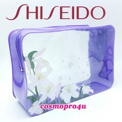 กระเป๋า SHISEIDO พลาสติกใสกันน้ำ ขอบทึบสีม่วง มีลายดอกไม้ที่กระเป๋า ใบใหญ่พอสมควร ใส่ของใช้ส่วนตัวเดินทางท่องเที่ยวได้ 8x5.5x3 นิ้ว