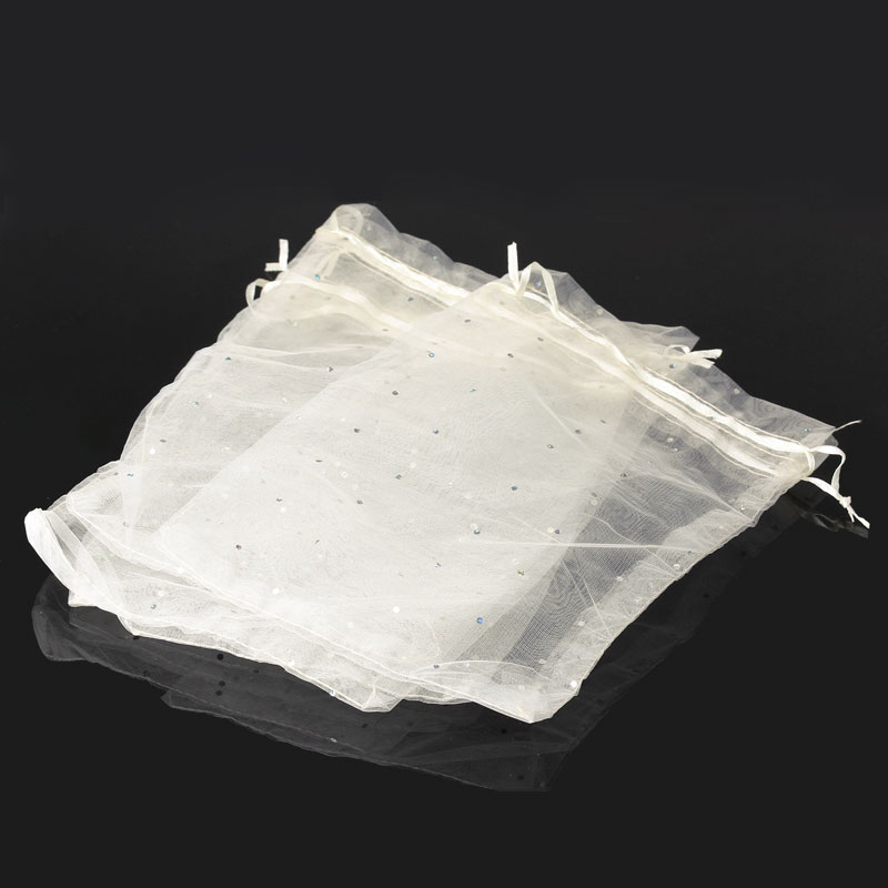 ถุงผ้าออแกนซ่ามีสายรูดรัดปากถุง 25cm x 18cm สีงาช้างวิบวับ