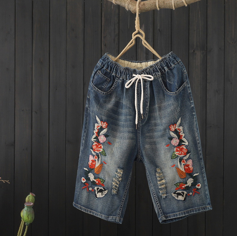 JPNT-002 กางเกงยีนส์ ปักลายดอกไม้สีส้ม ใส่สบายด้วยเอวยางยืด