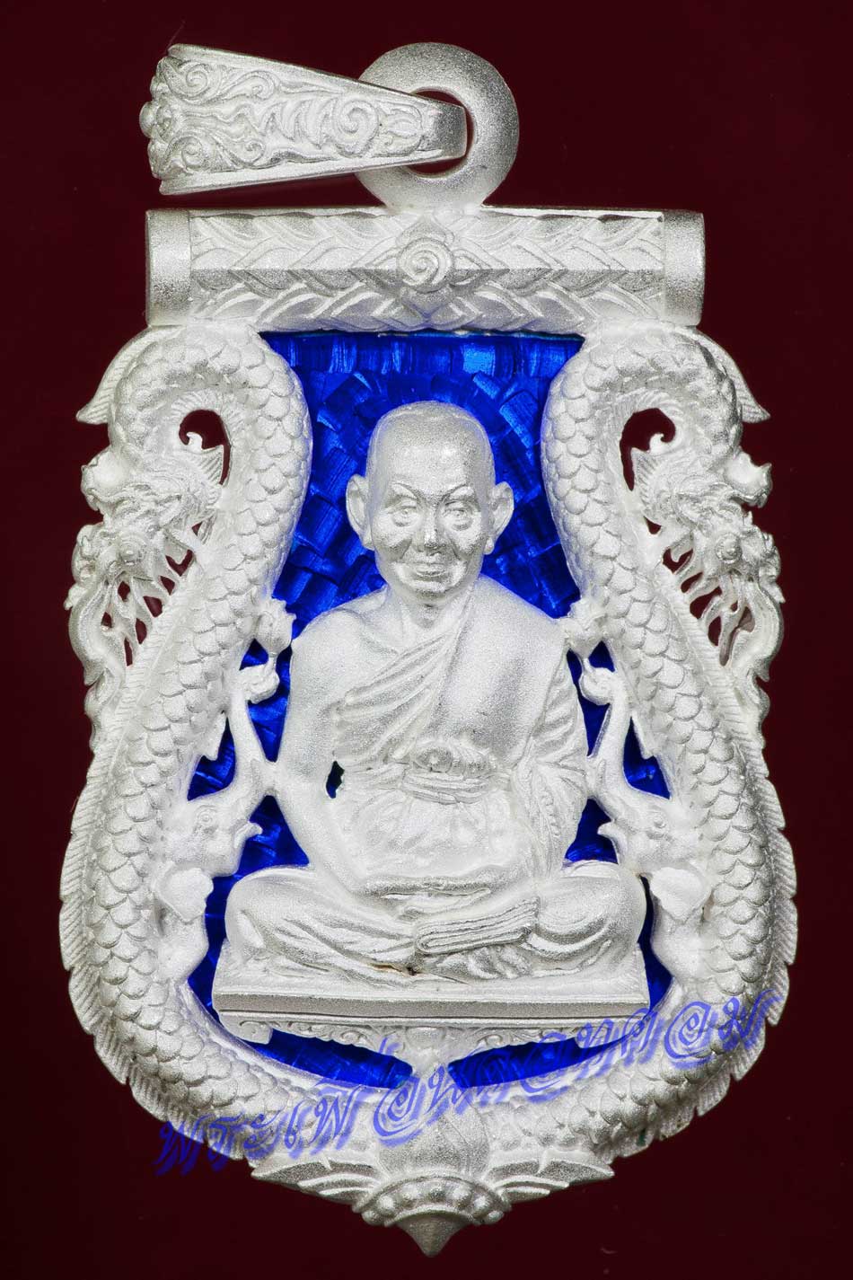 เหรียญเสมาฉลุลาย รุ่นนฤมิตรโชค หลวงพ่อจรัญ ฐิตธมฺโม ปี2554