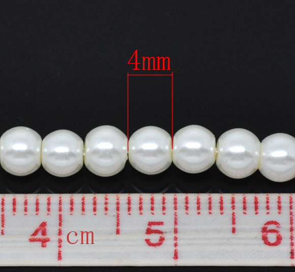 ลูกปัดแก้วมุกเที่ยมสีงาช้างเม็ดกลมขนาด 4มม. 1 เส้นประมาณ 200-210 เม็ด