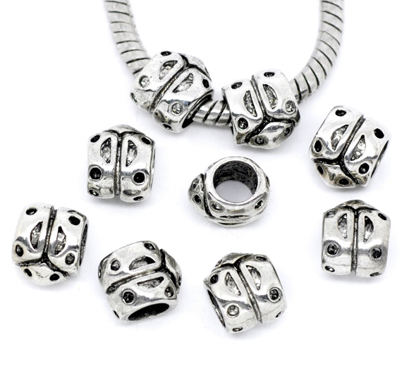 ลูกปัดเงินรูใหญ่รูปเต่าทอง ขนาด 9x8mm 5 เม็ด