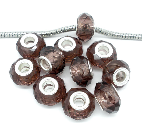 ลูกปัดแก้วสีน้ำตาลเม็ดกลมเหลี่ยมเจีย แกนเงิน ขนาด 14x9mm 10 เม็ด