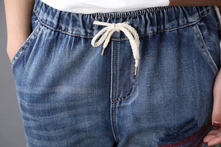 JPNT-006 กางเกงยีนส์ขายาว 5 ส่วน ปักลาย Graphic ดูเท่ห์ เอวยางยืด เนื้อผ้านิ่มไม่หนา