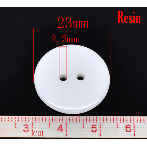 กระดุมเรซิ่นเนื้อเงาเม็ดกลมแบน 2 รู ขนาด 23 มม. สีขาว 1000 เม็ด พรีออเดอร์ ส่งสินค้า 7-10 วันหลังชำระเงิน
