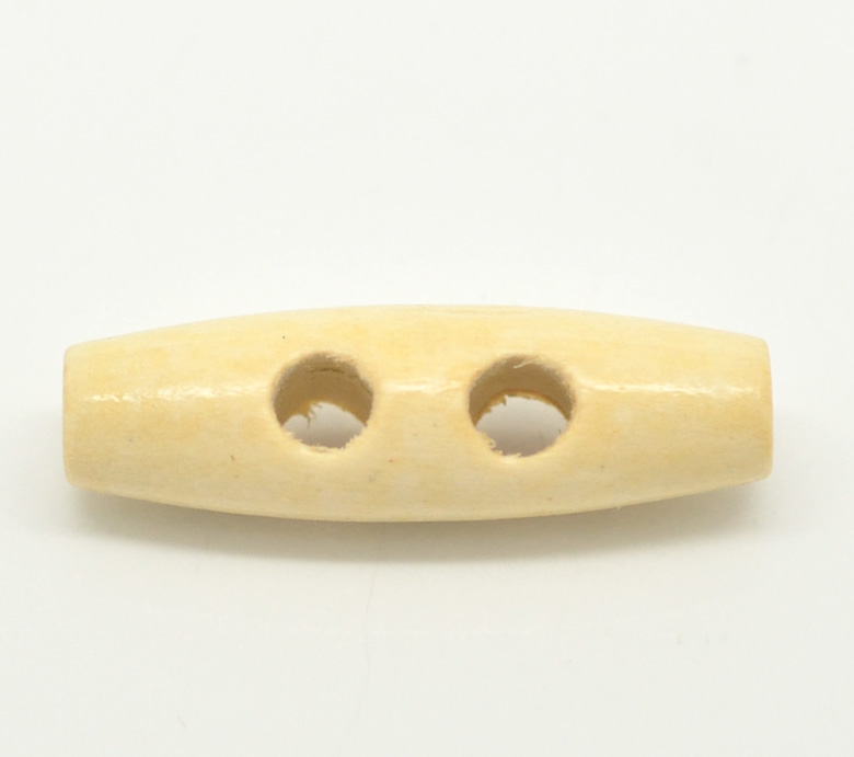 กระดุมไม้ แบบแท่ง 2 รู ยาว 3.5 ซม. สีงาช้าง แพ็ค 10 เม็ด