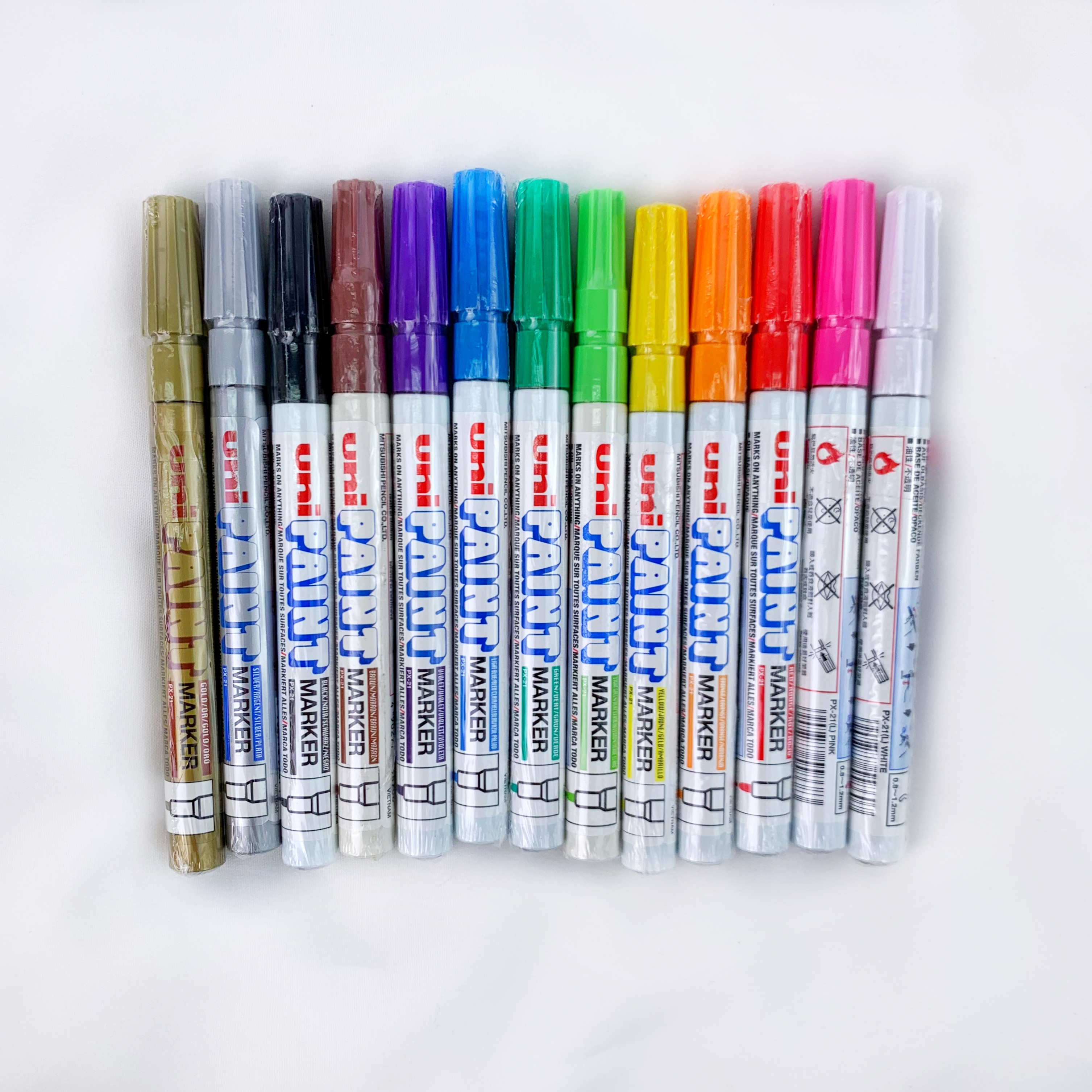 ปากกาเพ้นท์ Uni รุ่น PX-21 Paint Marker หัวกลม หัว 0.8-1.2 ตามองศาในการเขียน