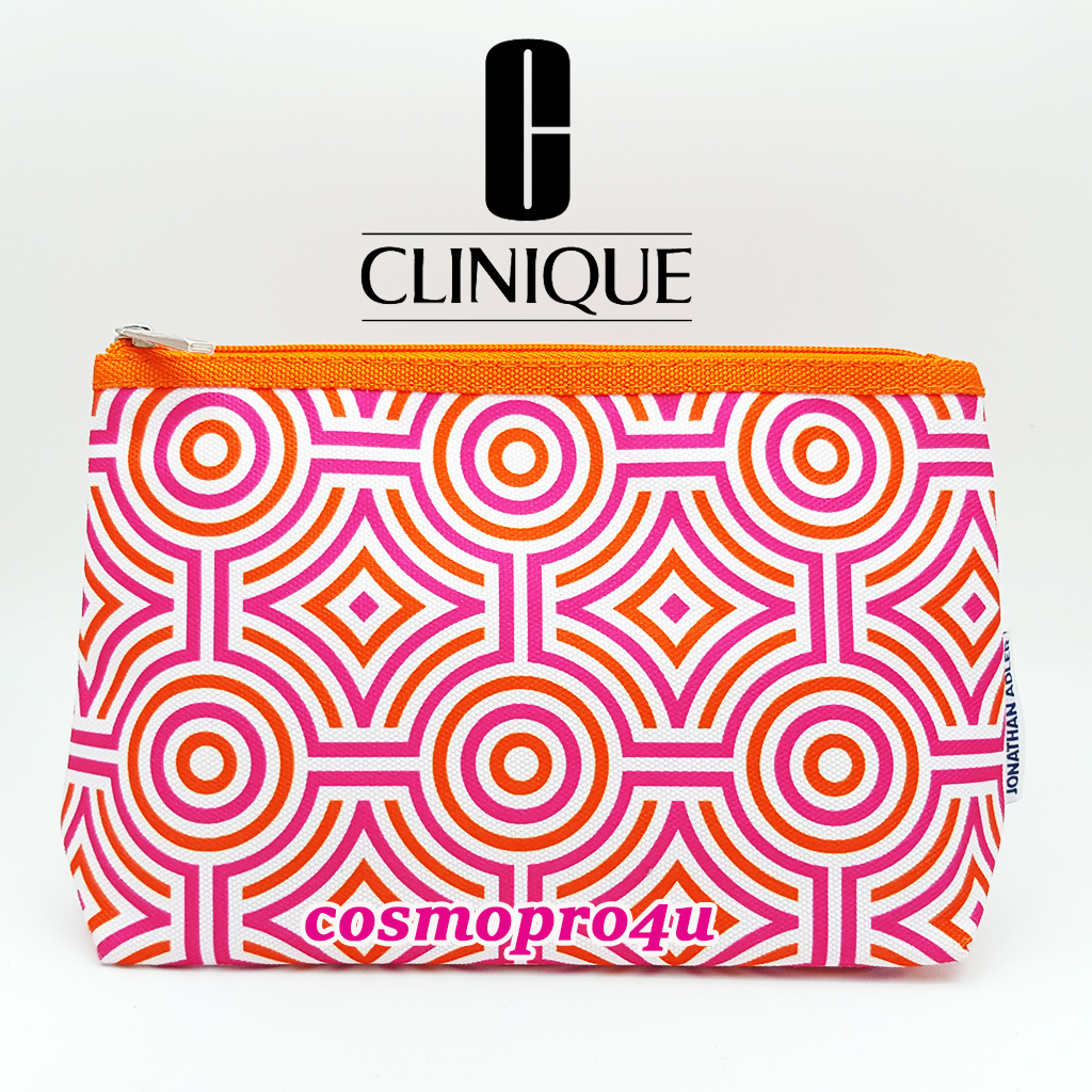 กระเป๋า CLINIQUE Jonathan Adler ขนาด 10x5.5 นิ้ว ผ้าหนา สีส้มชมพู ลายวง ตัดเย็บดี มีซับในสีส้ม