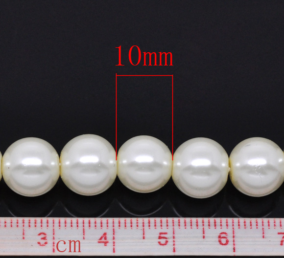 ลูกปัดแก้วมุกเทียมสีงาช้าง ขนาด 10 มิล 1 เส้นยาว 82cm (ประมาณ 80-90 เม็ด)