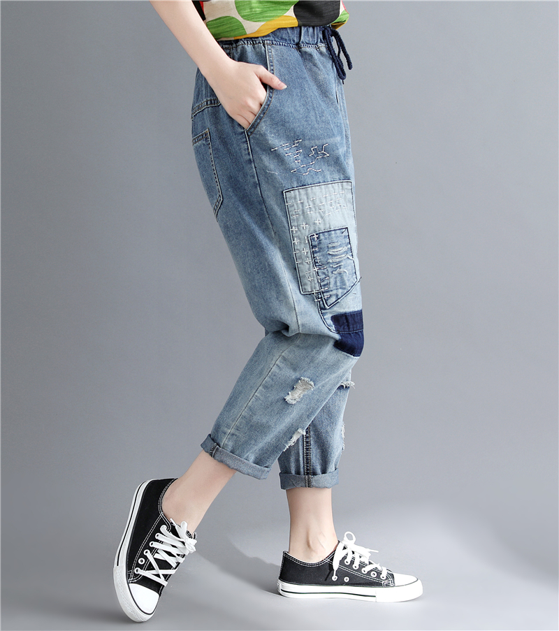 JPNT-010 กางเกงยีนส์ขายาว 5 ส่วน แต่งเซอร์ๆๆปะด้วยผ้าลายสวยงาม เอวยางยืด เนื้อผ้านิ่มไม่หนา