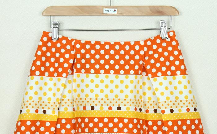 SK-265 กระโปรงแฟชั่น&ทำงาน ทรงบาน ผ้าคอตต้อนญี่ปุ่นพิมพ์ลายกราฟฟิกโทนส้ม