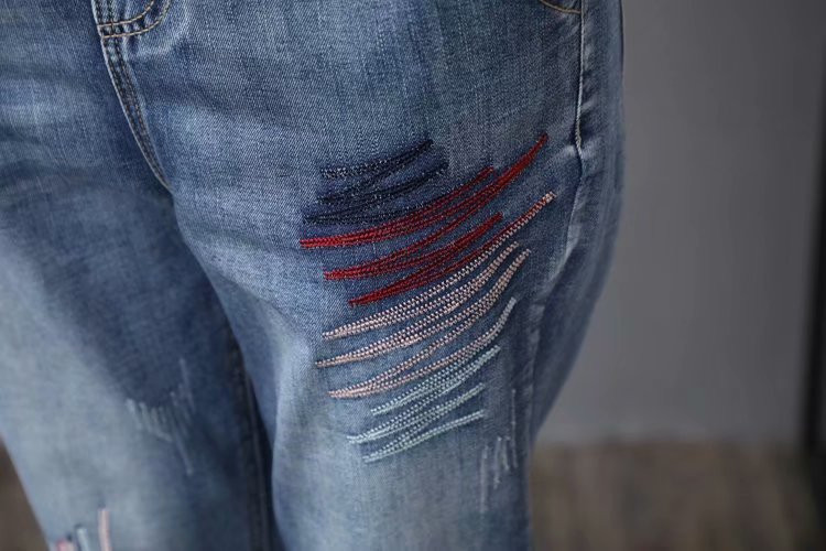 JPNT-006 กางเกงยีนส์ขายาว 5 ส่วน ปักลาย Graphic ดูเท่ห์ เอวยางยืด เนื้อผ้านิ่มไม่หนา