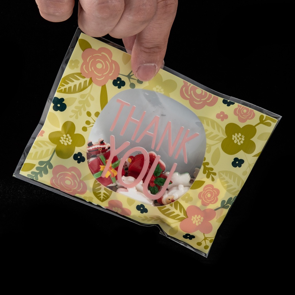 ถุงพลาสติกใสฝากาวลาย colorful สีขาว สำหรับใส่ขนม/คุกกี้/ลูกอมฯลฯ ขนาด 10x16cm (ส่วนใช้งาน 10x13cm) แพ็ค 95-100 ใบ