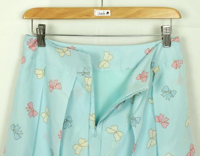 SK-176 กระโปรงแฟชั่น&ทำงาน ผ้าหางกระรอกพิมพ์ลายโบว์สีฟ้า มีโบว์ซ้อนกัน 2 ชั้น