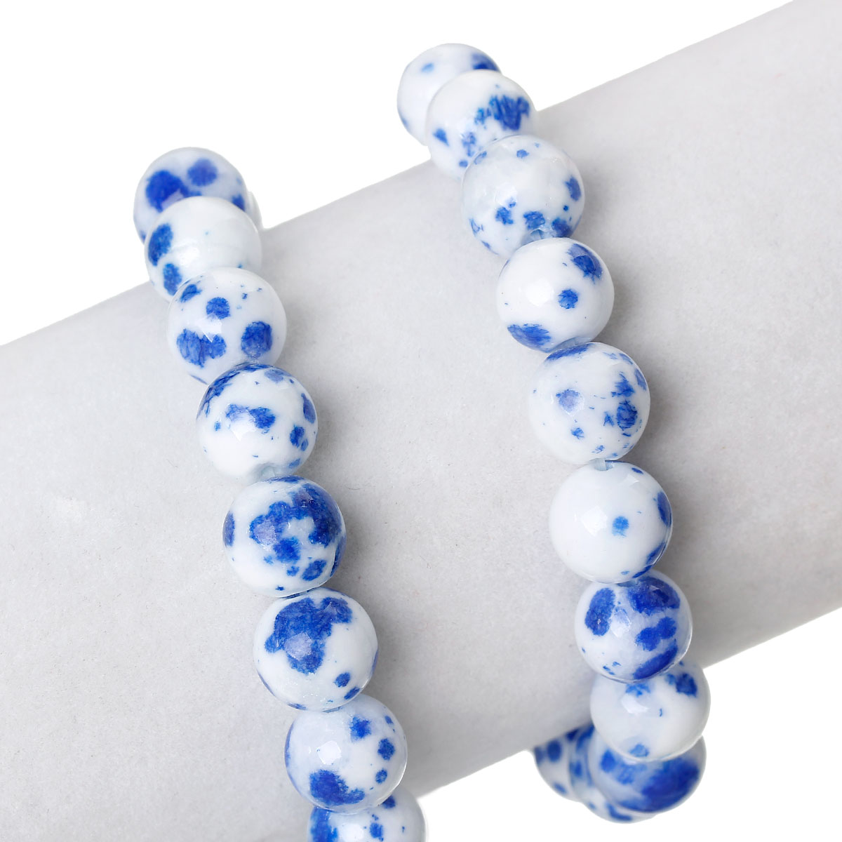 ลูกปัดGemstone หยก Marshan สังเคราะห์เกรด B เม็ดกลมสีขาวลายน้ำเงิน ขนาด 12 mm 1 เส้นยาว 38.5 cm ประมาณ 33 ชิ้น