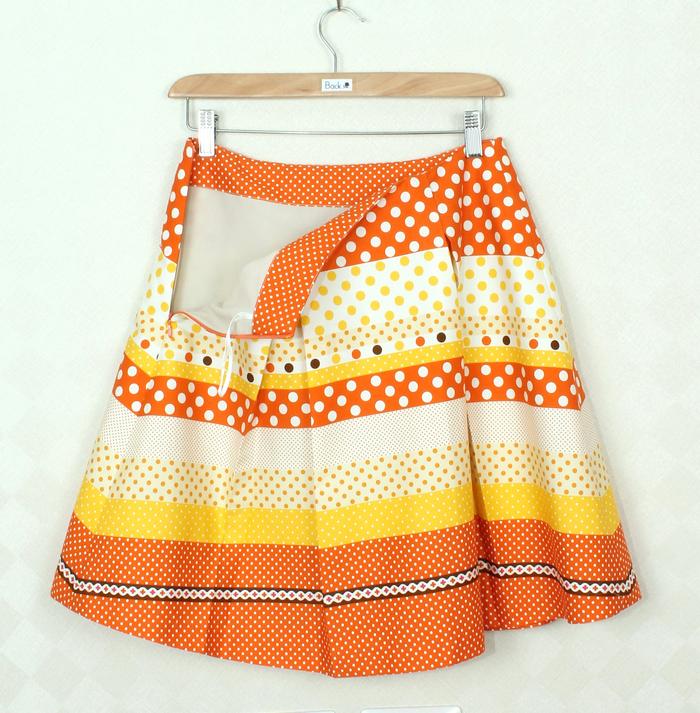 SK-265 กระโปรงแฟชั่น&ทำงาน ทรงบาน ผ้าคอตต้อนญี่ปุ่นพิมพ์ลายกราฟฟิกโทนส้ม