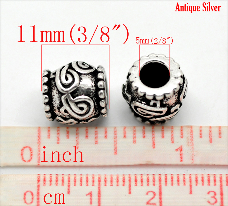 ลูกปัดเงินรูใหญ่แกะสลักริบบิ้น ขนาด 11x10mm 2 เม็ด