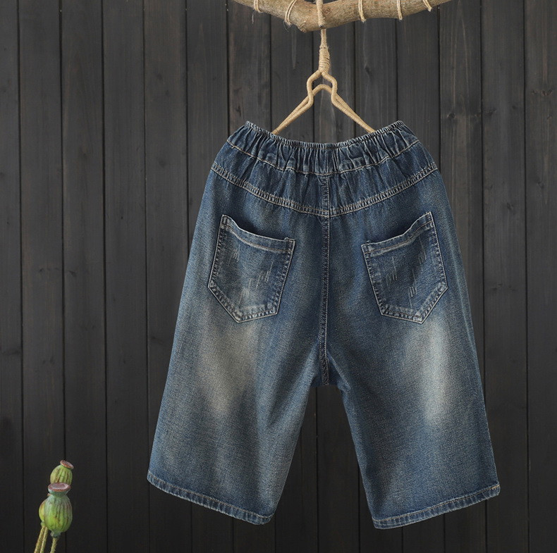 JPNT-002 กางเกงยีนส์ ปักลายดอกไม้สีส้ม ใส่สบายด้วยเอวยางยืด