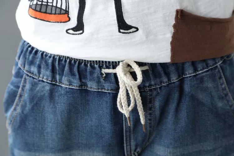 JPNT-007 กางเกงยีนส์ขายาว 5 ส่วน ปักลายดอกไม้เป็นกลุ่ม เอวยางยืด เนื้อผ้านิ่มไม่หนา