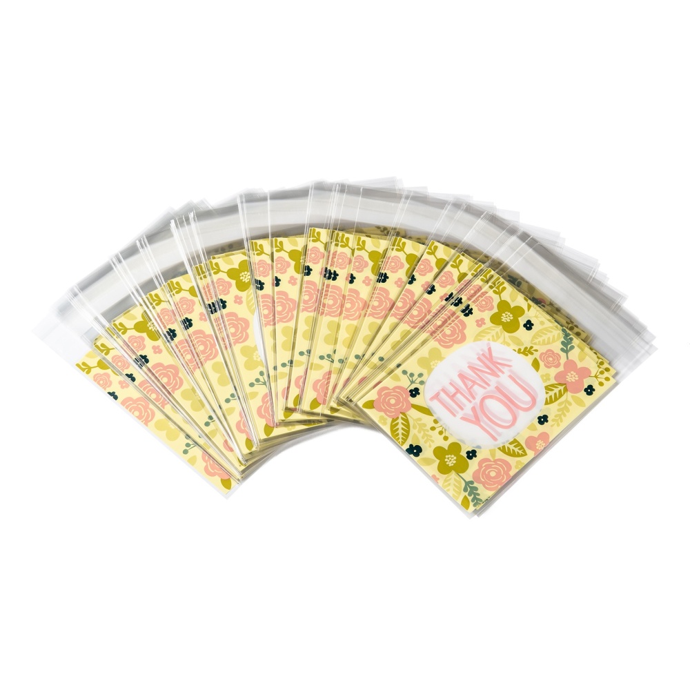 ถุงพลาสติกใสฝากาวลาย colorful สีขาว สำหรับใส่ขนม/คุกกี้/ลูกอมฯลฯ ขนาด 10x16cm (ส่วนใช้งาน 10x13cm) แพ็ค 95-100 ใบ