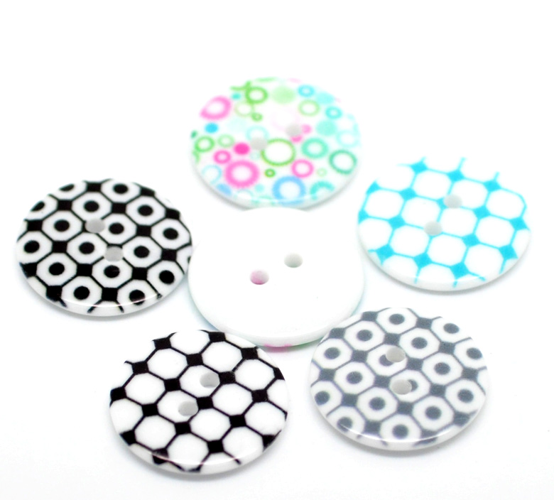 กระดุมเรซิ่น 2 รู 23mm. 50 เม็ด คละแบบ