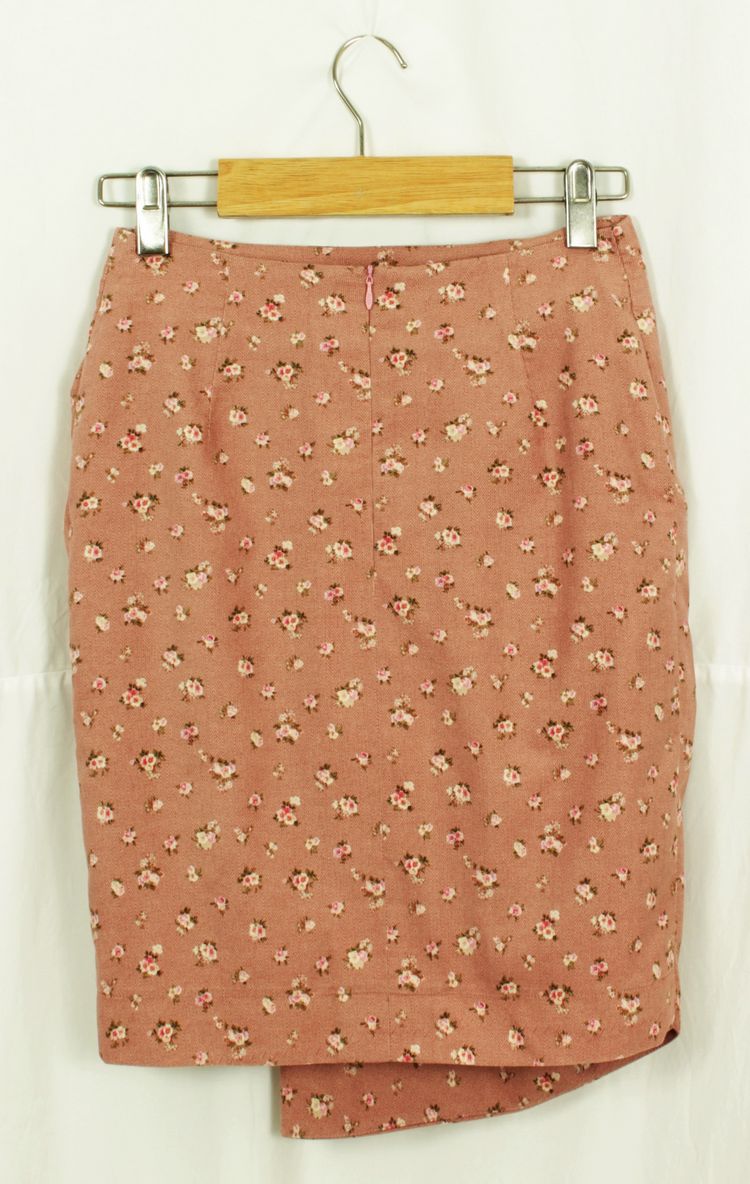 SK-137 กระโปรงโบว์แฟชั่น โทนสีชมพูพาสเทล ลายดอกกุหลาบเล็กๆ มีรูปโบว์ใหญ่ด้านหน้า