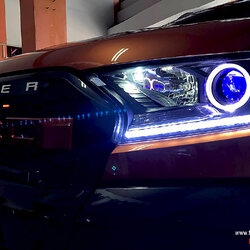 แต่งรถพะเยา 🚩Ford Ranger🚩 #อัพเกรดไฟหน้า #โปรเจคเตอร์ Bi-Beam LED สว่าง สวยงาม แบบจบ ๆ พร้อมวาง #เดย์ไลท์บาร์ คริสตัล เสริมความหล่อด้วย LED เดวิลอายสีน้ำเงินสวยๆ จบปัญหา #ไฟหน้าไม่สว่าง ไปอีกคัน👍🔥