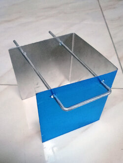 ที่กั้นลมพร้อมที่วางตะแกรงลวด