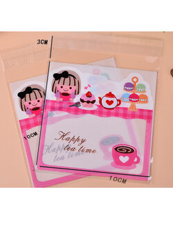 ถุงพลาสติกพิมพ์ลาย Happy tea time โทนสีชมพูสำหรับใส่ขนม/คุกกี้ ขนาด 13x10 ซม. (ส่วนใช้งาน 10x10 ซม.) 1 แพ็ค มี 96-100 ใบ