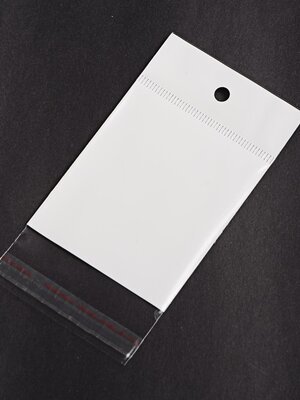 ถุงพลาสติก ฝากาว มีรูแขวน หน้าใสหลังขาว ขนาด 9.5x16.5 ซม.(ส่วนใช้งาน 9.5x10.7 ซม.) รู 6 มม. หนา 0.05 มม.