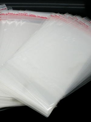 ถุงพลาสติกใส OPP(ถุงแก้ว) ฝากาว+หัวรูแขวน ขนาด 7x13.5 ซม. (ส่วนใช้งาน 7x9 ซม.) หนา 0.035 มม.