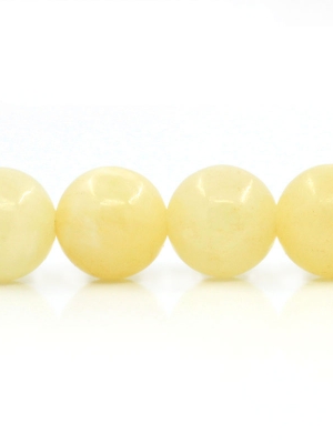 ลูกปัดหินJasperเหลืองสังเคราะห์ ขนาด 10mm เม็ดกลมสีเหลืองอ่อน 1 เส้นยาว 38cm ประมาณ 39 เม็ด