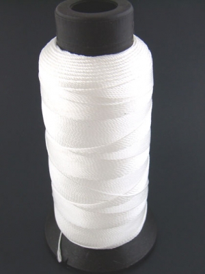 ด้ายคอตตอนมันวาว 0.6มม. 1 หลอด ยาว500M สีขาว
