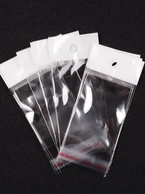 ถุงพลาสติกใส OPP(ถุงแก้ว) ฝากาว มีรูแขวนหัวมุก ขนาด 4x10 ซม.(ส่วนใช้งาน 4x6 ซม.) หนา 0.023 มม